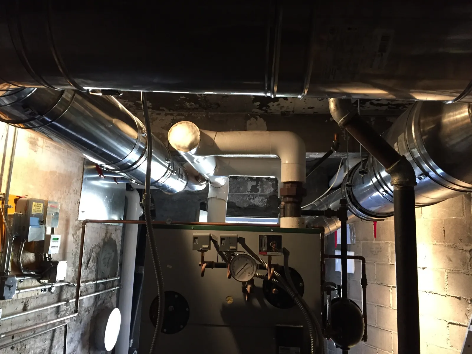 Tight mechanical room layout coordinated on-site with the installing contractor.