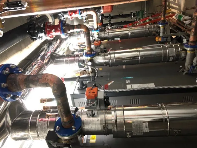 Detail of the modulating damper and controller wiring at the boiler connector.